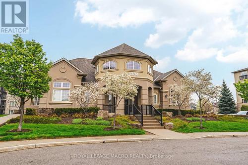 212 - 1491 Maple Avenue, Milton (Dempsey), ON - Outdoor With Facade