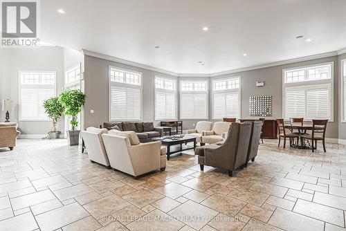 212 - 1491 Maple Avenue, Milton (Dempsey), ON - Indoor Photo Showing Living Room