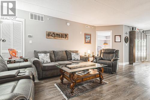 212 - 1491 Maple Avenue, Milton (Dempsey), ON - Indoor Photo Showing Living Room