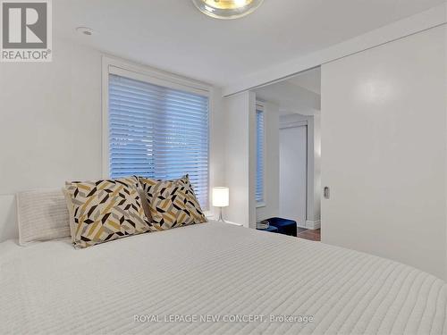 Th725 - 10 Laidlaw Street, Toronto, ON - Indoor Photo Showing Bedroom