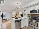 Th725 - 10 Laidlaw Street, Toronto (South Parkdale), ON  - Indoor Photo Showing Kitchen 