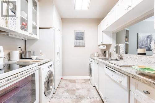 112 - 65 Trailwood Drive, Mississauga, ON - Indoor Photo Showing Laundry Room