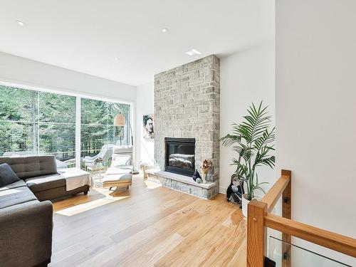 Salon - 1200 Ch. Du Millepertuis, Piedmont, QC - Indoor Photo Showing Living Room With Fireplace