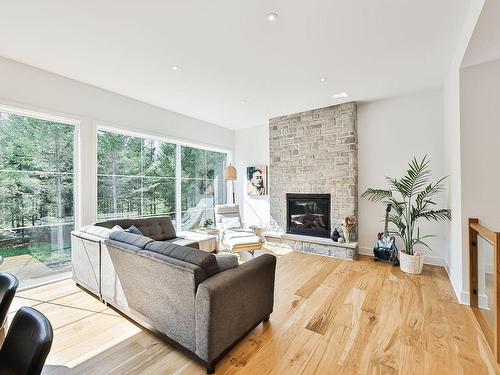 Salon - 1200 Ch. Du Millepertuis, Piedmont, QC - Indoor Photo Showing Living Room With Fireplace