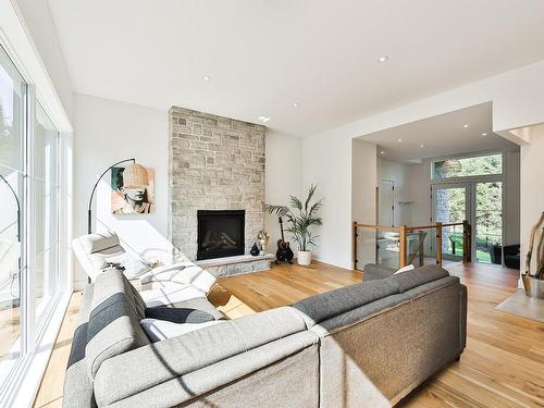 Salon - 1200 Ch. Du Millepertuis, Piedmont, QC - Indoor Photo Showing Living Room With Fireplace