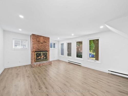 323 Annshiela Dr, Georgina, ON - Indoor Photo Showing Living Room With Fireplace