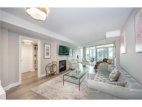 325-11 Bronte Rd, Oakville, ON - Indoor Photo Showing Living Room With Fireplace