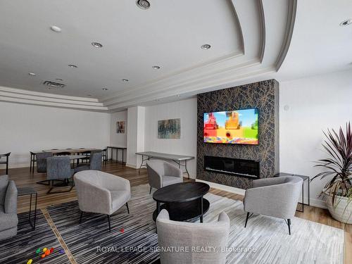 324-1001 Roselawn Ave, Toronto, ON - Indoor Photo Showing Living Room With Fireplace