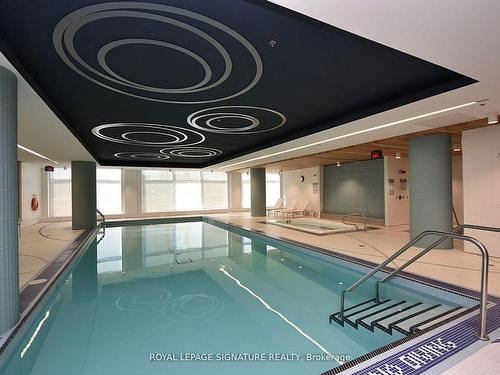 505-65 Speers Rd E, Oakville, ON - Indoor Photo Showing Other Room With In Ground Pool