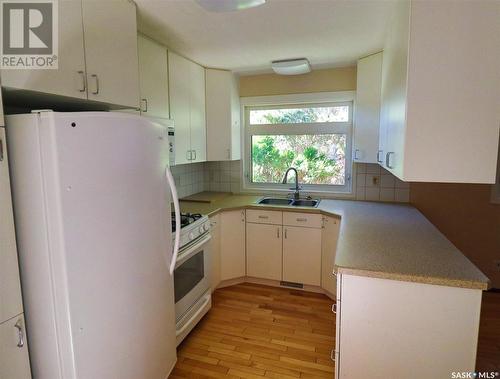 414 1St Street N, Cabri, SK - Indoor Photo Showing Kitchen With Double Sink