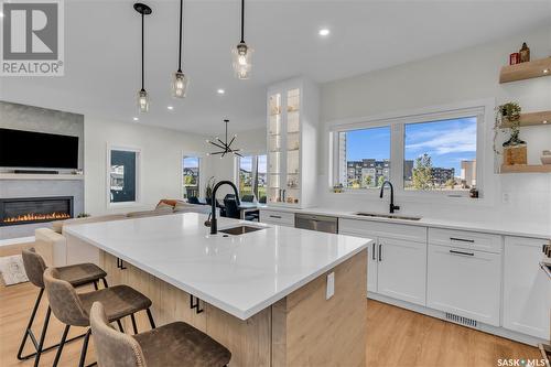 5217 E Green Crescent, Regina, SK - Indoor Photo Showing Kitchen With Fireplace With Upgraded Kitchen