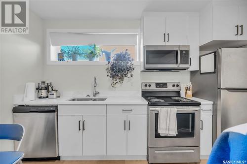 5217 E Green Crescent, Regina, SK - Indoor Photo Showing Kitchen With Stainless Steel Kitchen With Double Sink