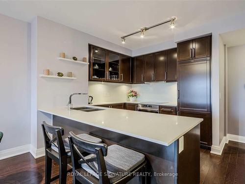 408-21 Clairtrell Rd, Toronto, ON - Indoor Photo Showing Kitchen With Double Sink