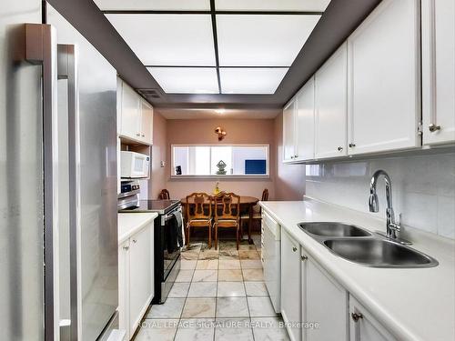 506-3151 Bridletowne Circ, Toronto, ON - Indoor Photo Showing Kitchen With Double Sink