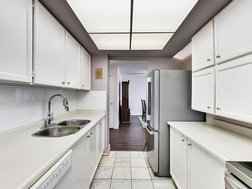 506-3151 Bridletowne Circ, Toronto, ON - Indoor Photo Showing Kitchen With Double Sink