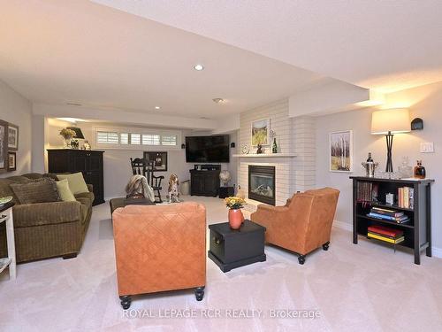 13 Briar Gate Way, New Tecumseth, ON - Indoor Photo Showing Living Room With Fireplace