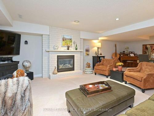 13 Briar Gate Way, New Tecumseth, ON - Indoor Photo Showing Living Room With Fireplace