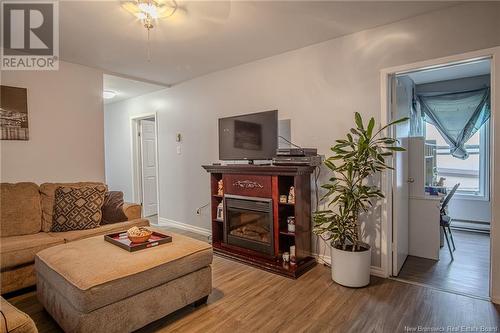 63 Bryden Street, Saint John, NB - Indoor Photo Showing Living Room With Fireplace