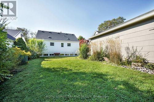 Backyard facing home and garage - 474 Moore Street N, London, ON - Outdoor