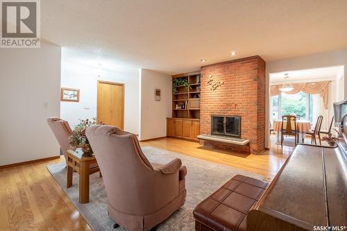 1309 Shannon Road, Regina, SK - Indoor Photo Showing Living Room With Fireplace