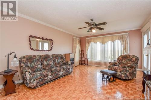 852 Principal Road, Petit-Paquetville, NB - Indoor Photo Showing Living Room With Fireplace