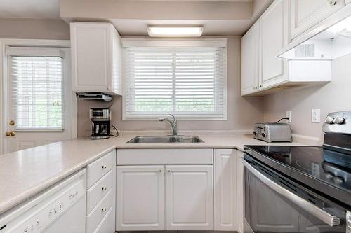 4311 Belfast Avenue, Burlington, ON - Indoor Photo Showing Kitchen With Double Sink