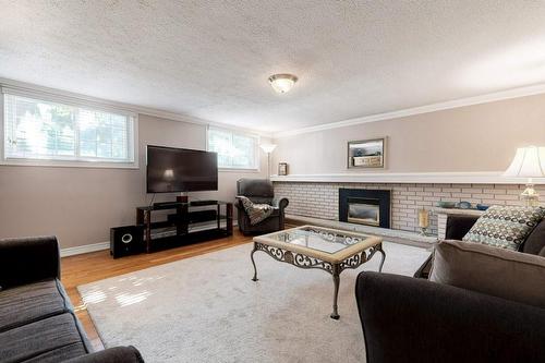 4311 Belfast Avenue, Burlington, ON - Indoor Photo Showing Living Room With Fireplace