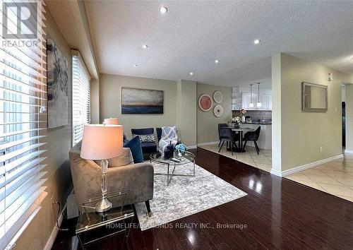 18 - 164 Moregate Crescent, Brampton, ON - Indoor Photo Showing Living Room With Fireplace