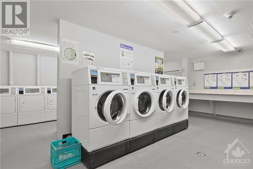 Laundry Center in Basement - 2000 Jasmine Crescent Unit#1208, Ottawa, ON - Indoor Photo Showing Laundry Room