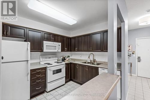 114 - 1000 The Esplanade N, Pickering (Town Centre), ON - Indoor Photo Showing Kitchen With Double Sink