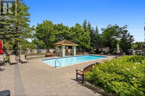 114 - 1000 The Esplanade N, Pickering, ON - Outdoor With In Ground Pool With Backyard