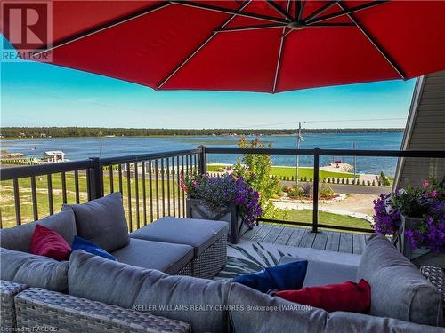 112 Tamarac Road, Northern Bruce Peninsula, ON - Outdoor With Body Of Water With Deck Patio Veranda With View With Exterior