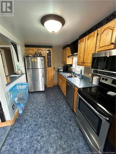 102/104 Kenmore Drive, Moncton, NB - Indoor Photo Showing Kitchen With Double Sink