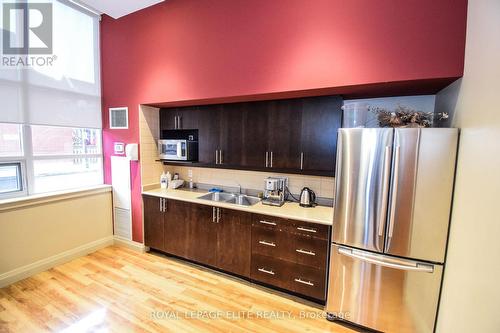 203 - 4 Elsinore Path, Toronto (New Toronto), ON - Indoor Photo Showing Kitchen With Double Sink