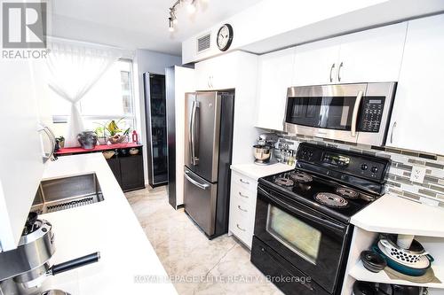 203 - 4 Elsinore Path, Toronto (New Toronto), ON - Indoor Photo Showing Kitchen With Stainless Steel Kitchen