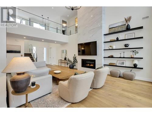 419 Hawk Hill Drive, Kelowna, BC - Indoor Photo Showing Living Room With Fireplace