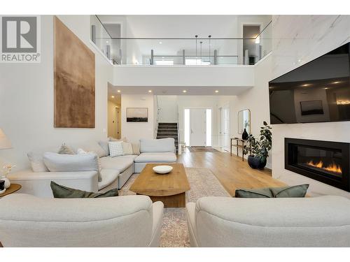 419 Hawk Hill Drive, Kelowna, BC - Indoor Photo Showing Living Room With Fireplace