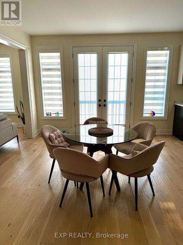 24 Upbound Court, East Gwillimbury (Holland Landing), ON - Indoor Photo Showing Dining Room With Fireplace