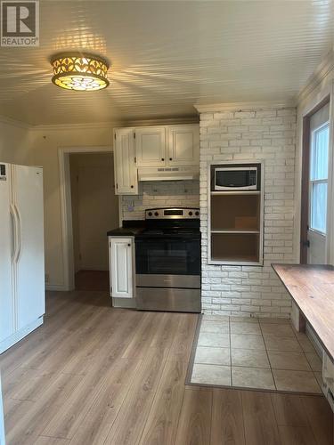 10 Macklin Place, St.John’S, NL - Indoor Photo Showing Kitchen With Fireplace