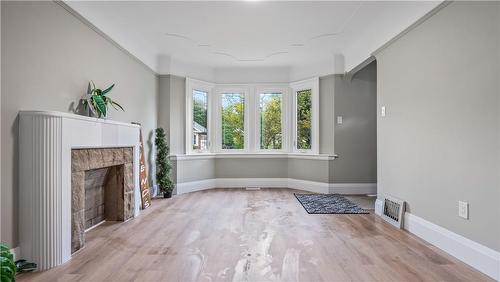 139 Longwood Road N, Hamilton, ON - Indoor Photo Showing Other Room With Fireplace