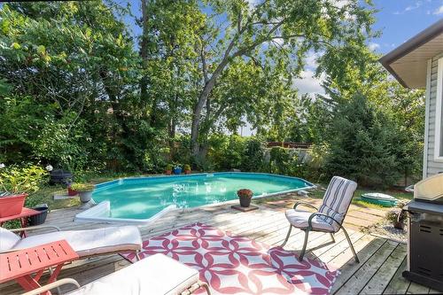 4012 Kingston Court, Burlington, ON - Outdoor With Above Ground Pool With Deck Patio Veranda With Backyard