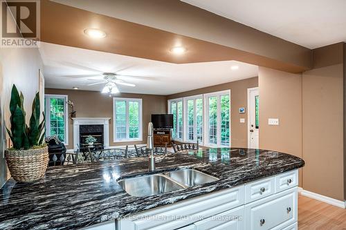 16 Durham Road, Hamilton (Stoney Creek), ON - Indoor Photo Showing Kitchen With Fireplace With Double Sink