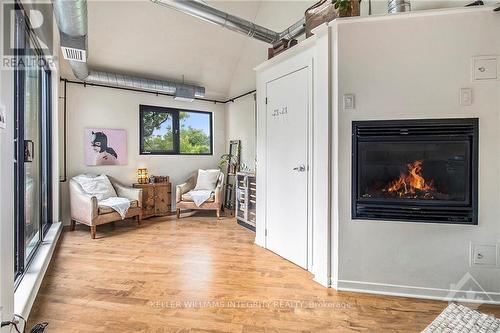 303 - 95 Beech Street, Ottawa, ON - Indoor Photo Showing Other Room With Fireplace