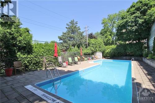 2019 Carling Avenue Unit#702, Ottawa, ON - Outdoor With In Ground Pool With Backyard