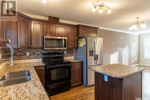 411 315 Hampton Circle, Saskatoon, SK - Indoor Photo Showing Kitchen With Double Sink