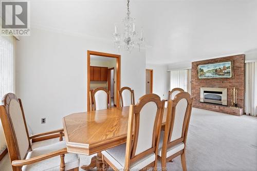 4033 Howard, Windsor, ON - Indoor Photo Showing Dining Room With Fireplace