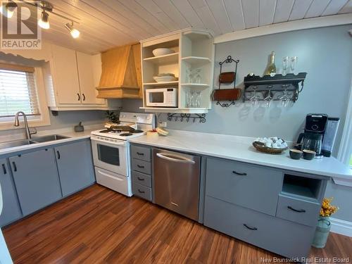 1645 Ch. Wilson Point, Miscou, NB - Indoor Photo Showing Kitchen With Double Sink