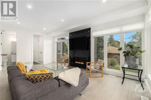 43 Rossland Avenue, Ottawa, ON - Indoor Photo Showing Living Room With Fireplace