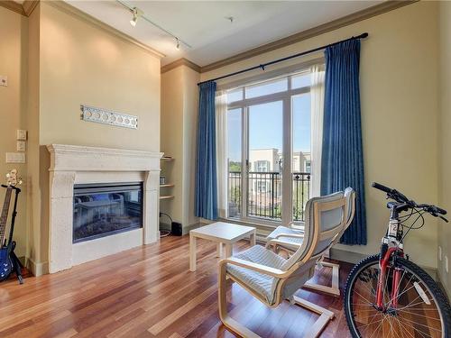 405-1620 Mckenzie Ave, Saanich, BC - Indoor Photo Showing Living Room With Fireplace