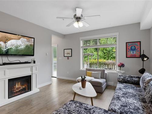 105-1900 Tulsa Rd, Nanaimo, BC - Indoor Photo Showing Living Room With Fireplace